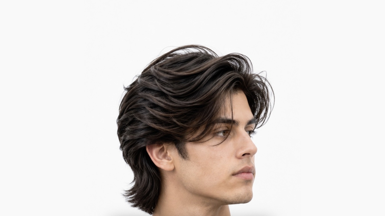 Long textured flow haircut with tapered sides